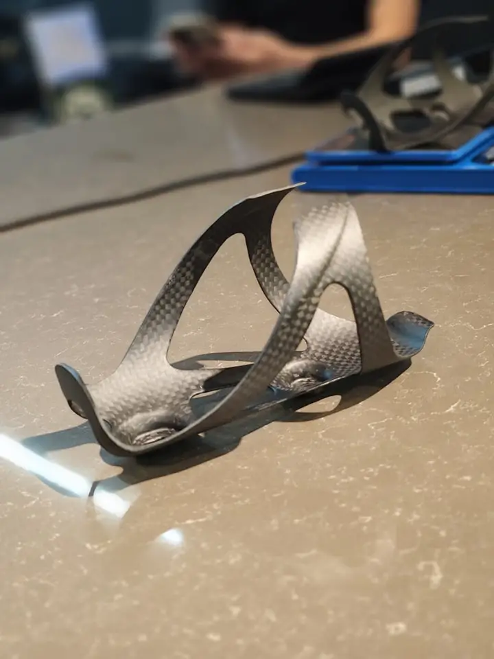 USED Carbon Bottle Cage for sale