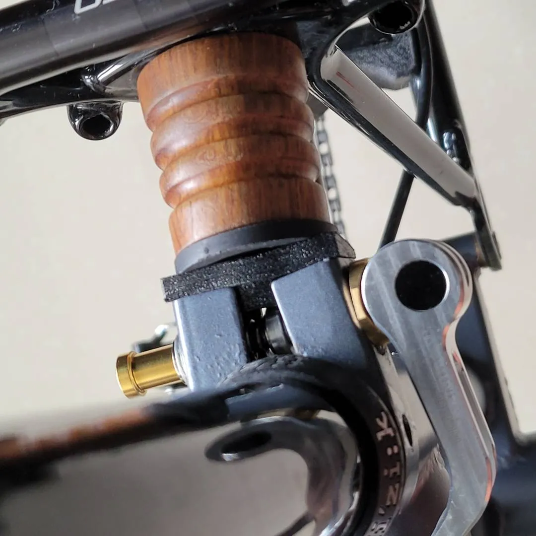 Brompton shim triangle latch suspension block