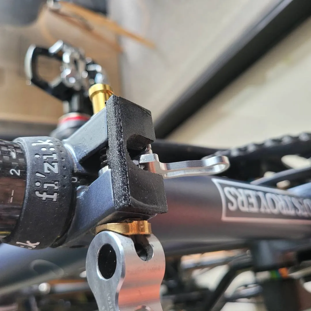Brompton shim triangle latch suspension block
