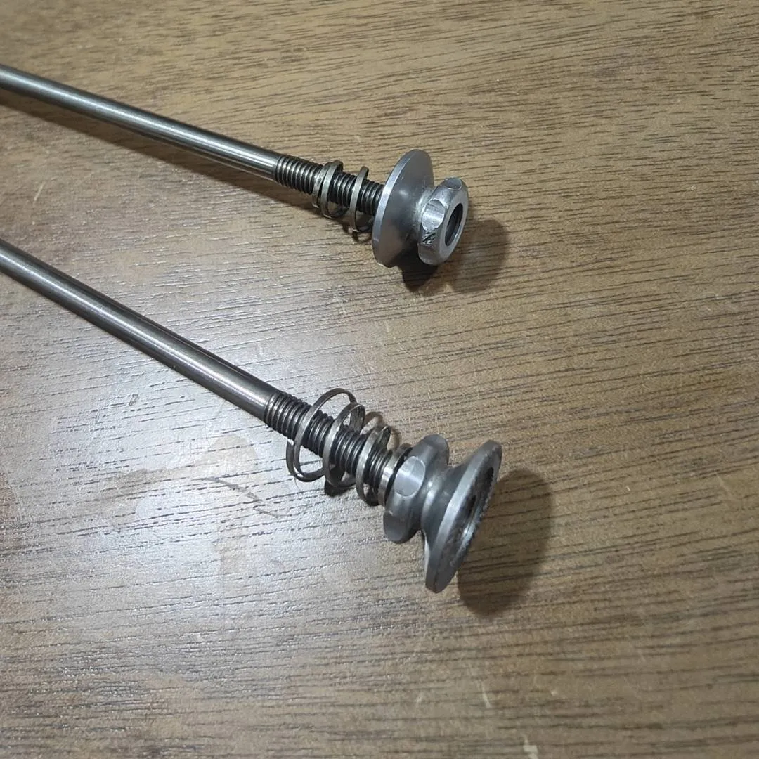 After market titanium skewers for road bike