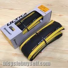 CONTINENTAL ULTRA SPORT III ROAD TIRE (BLACK/YELLOW FOLDABLE SKIN)