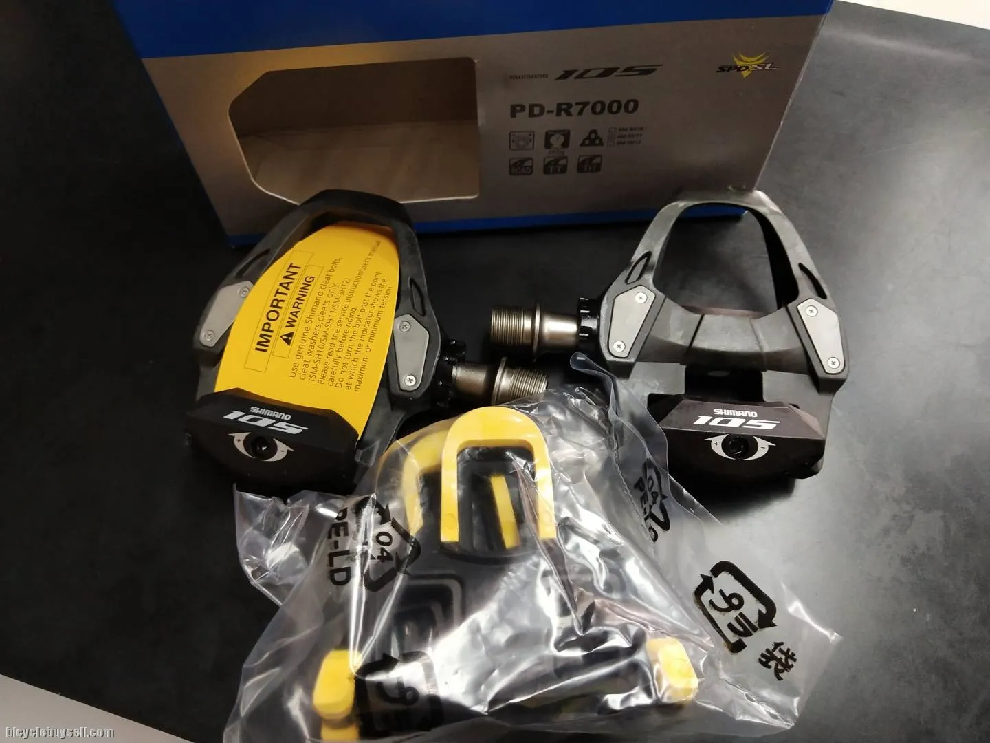 Shimano R7000 pedals with yellow cleat