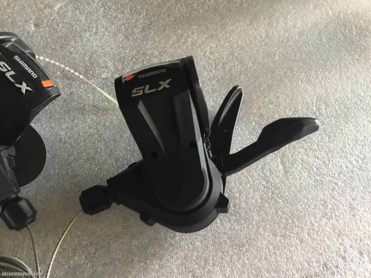 Shimano SLX M660 Trigger Shifter 3/9speed  @ free pos