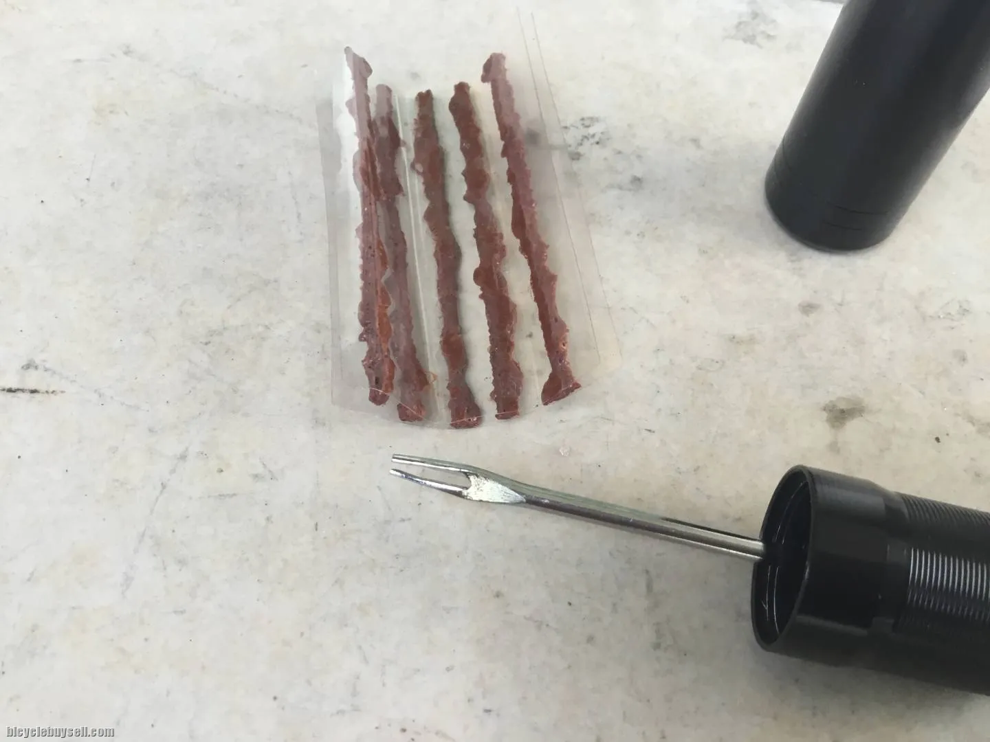 Tubeless/Tubular Cigar Tool Fixes Punctures in Style--  free courier