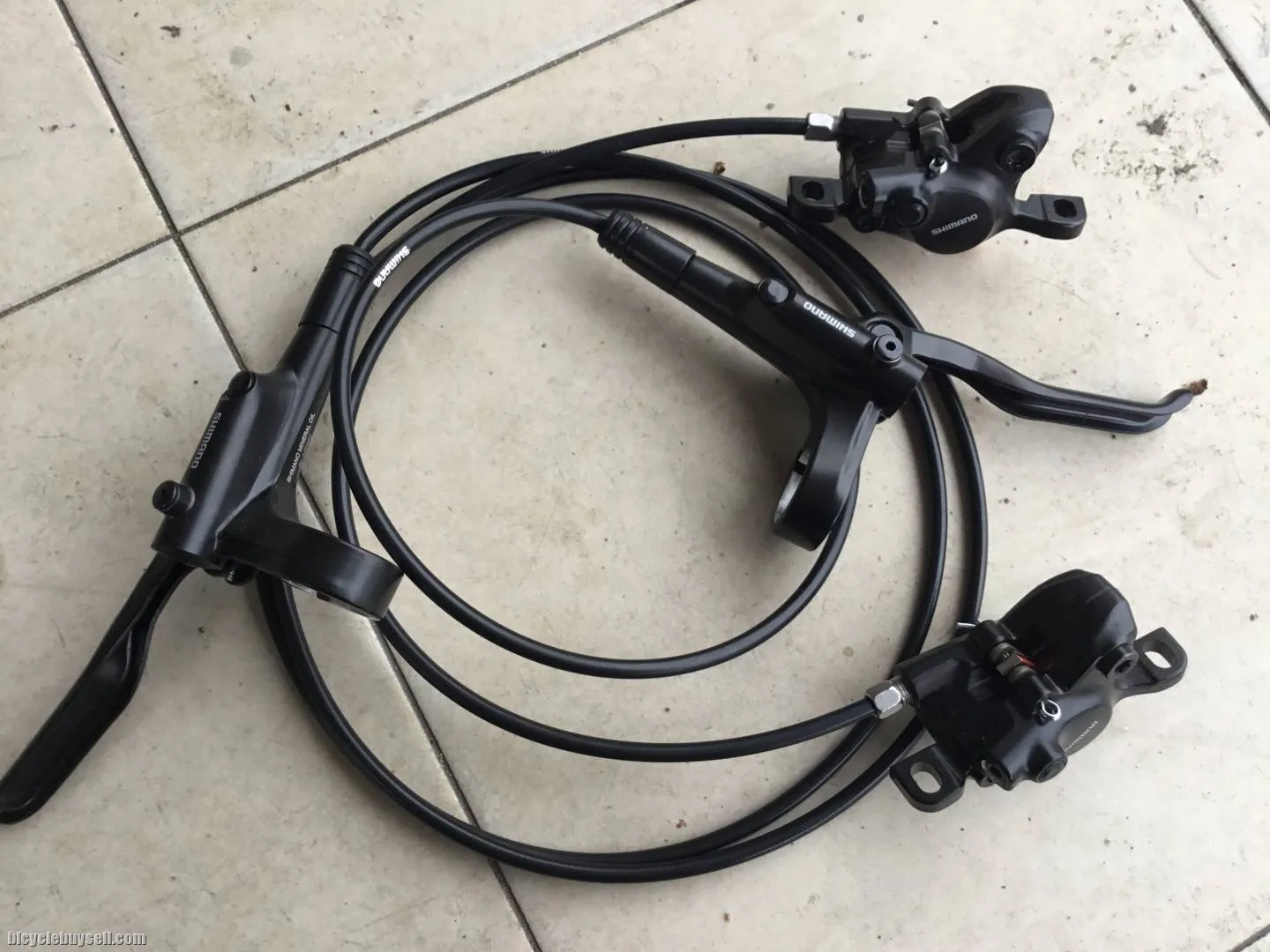 Shimano hidaulic brake M200 -- free Courier