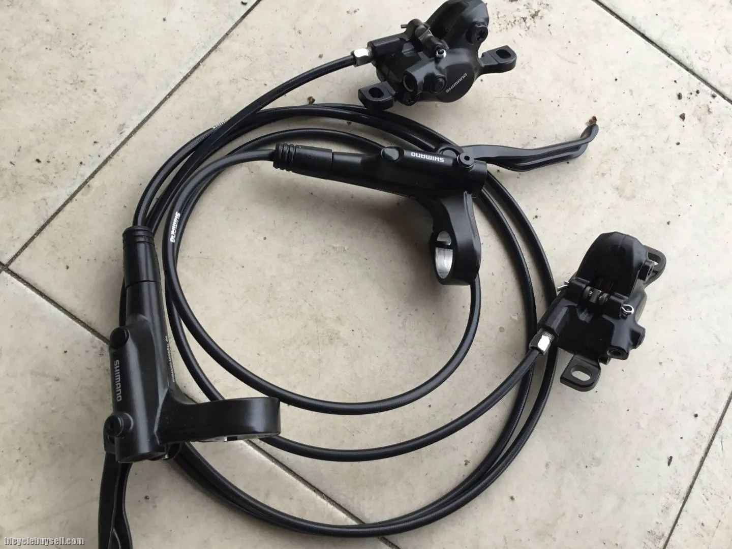 Shimano hidaulic brake M200 -- free Courier