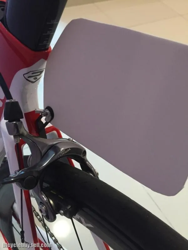 Race number holder clip for rear break caliper