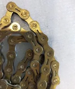 YBN 10 SPEED SEMI HOLLOW GOLD CHAIN - TIP TIP CONDITION, 4 WEEKS USED ONLY - USED CHAIN