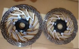 SHIMANO CENTER LOCK ROTOR FROM SPECIALIZED BIKE 160+180MM PAIR - USED MILEAGE LESS THAN 150KM