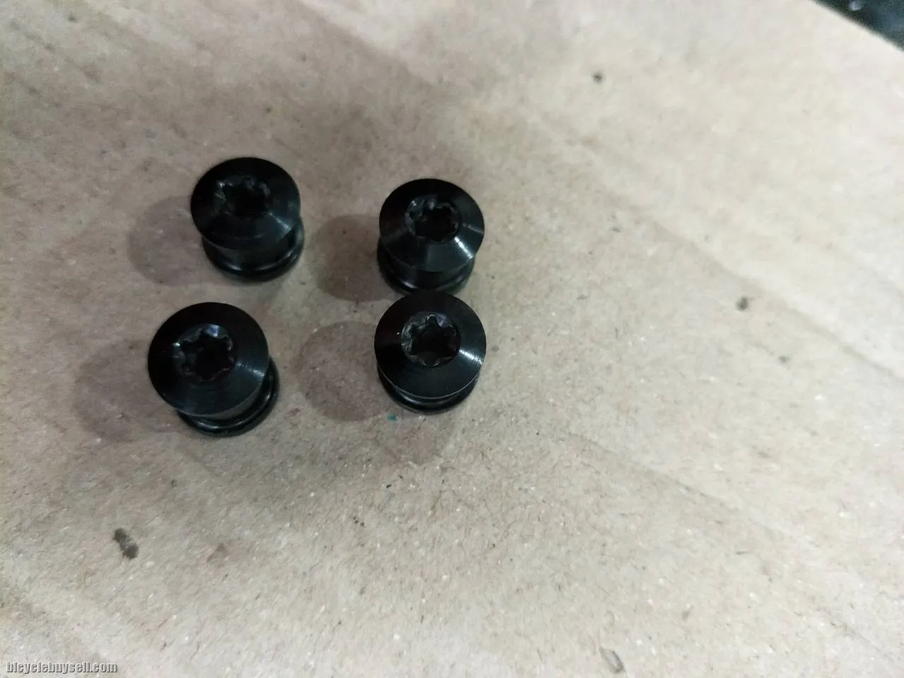 Shimano deore xt chainring bolts - taken out from new crankset to modify color