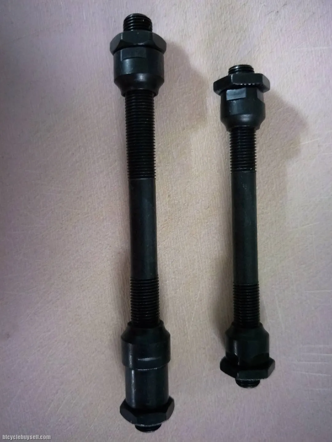 Chromoly hardened hollow axle for quick release conversion