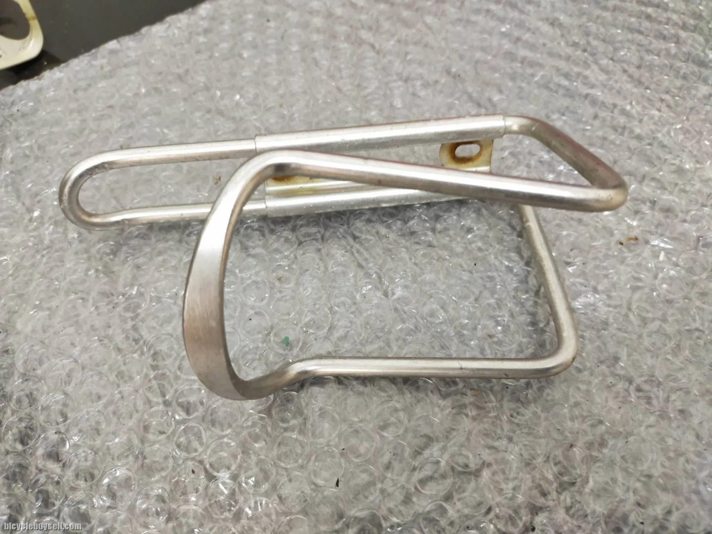 ALLOY USED ULTRALITE BOTTLE CAGE - USED LESS THAN 3 MONTHS