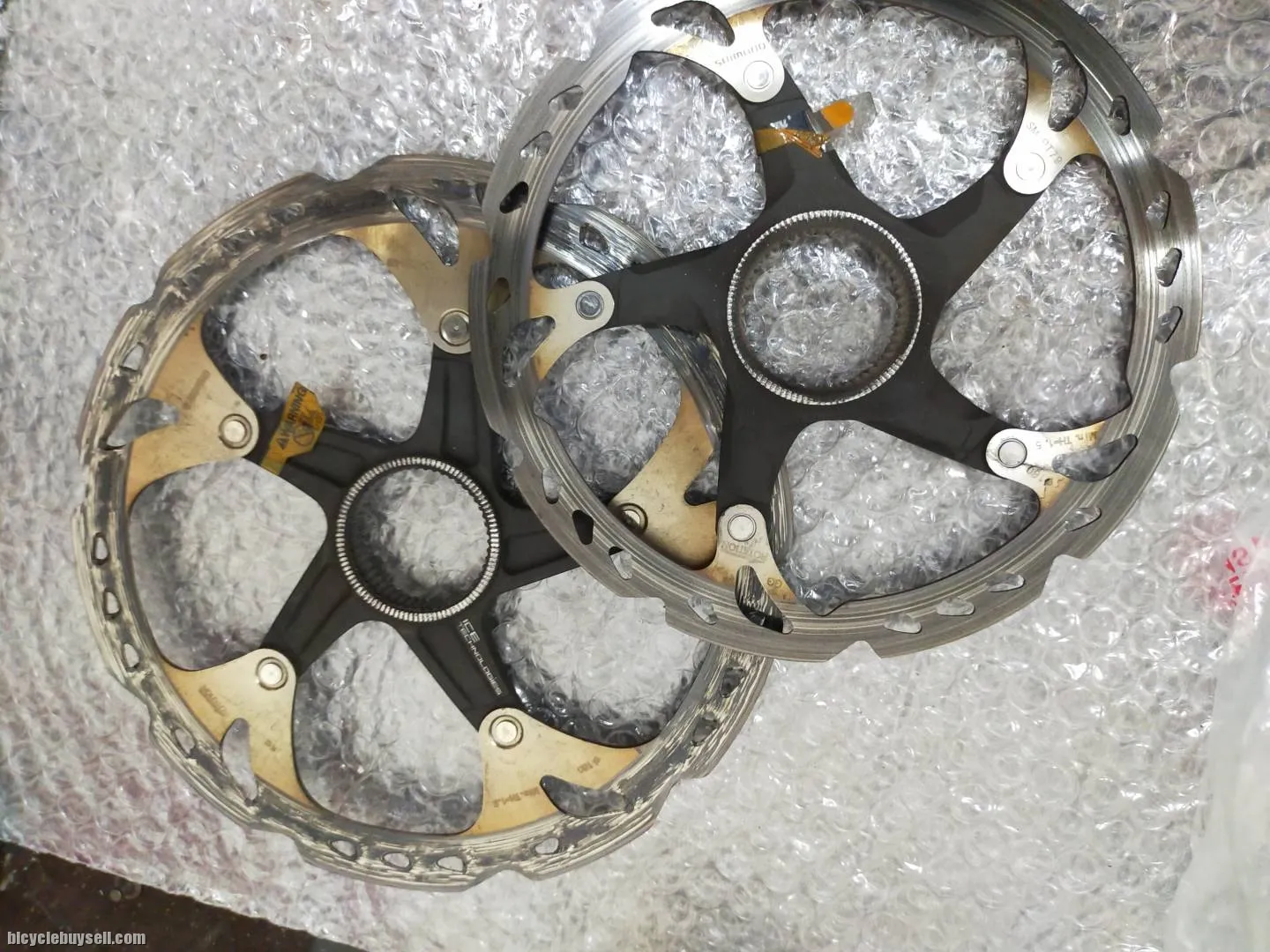 SHIMANO ROTOR USED 2 PIECES - PAIR 180MM 2PIECE CENTER LOCK